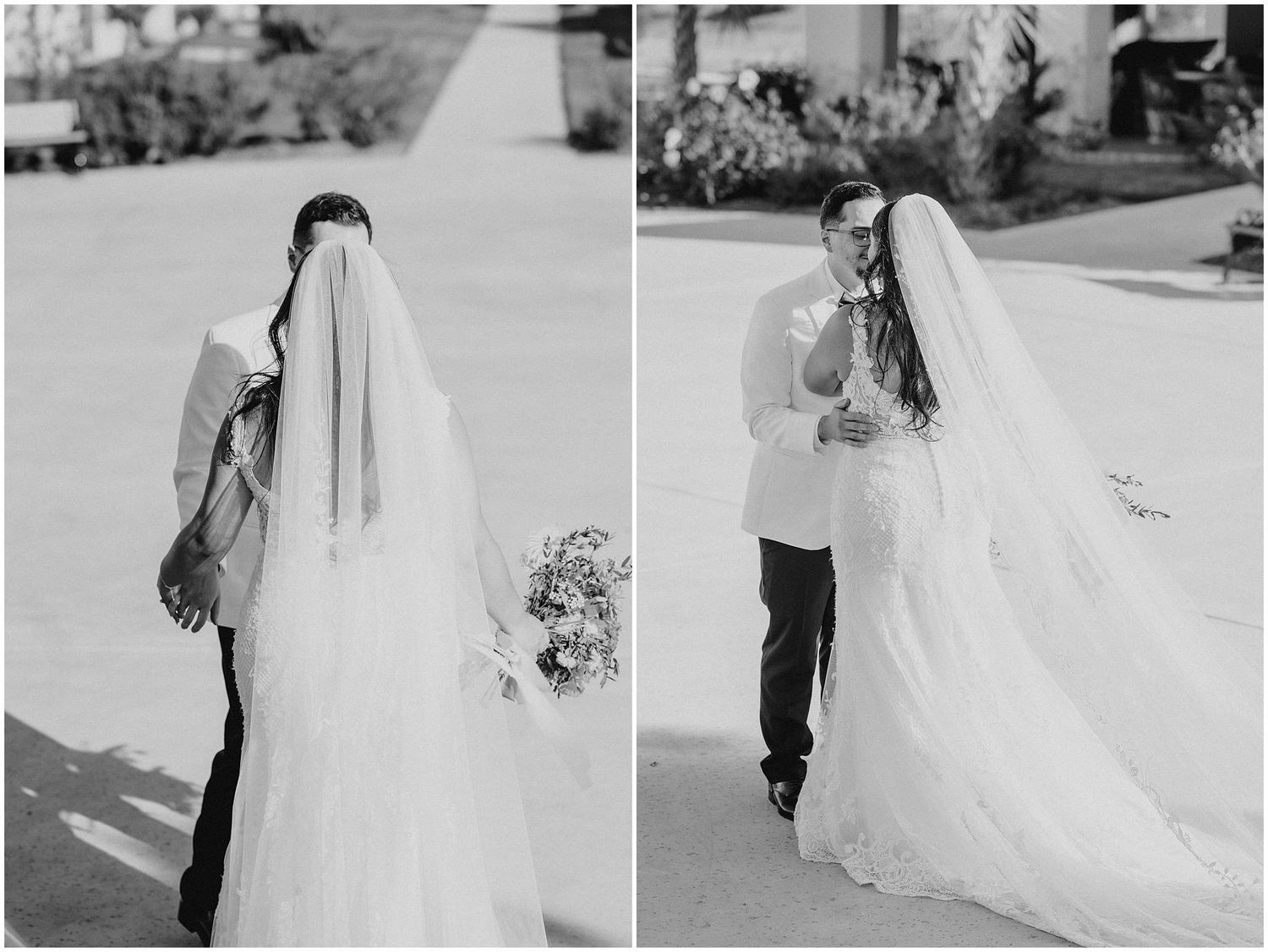 Bride in flowing white dress walking outdoors in bright sunlight.