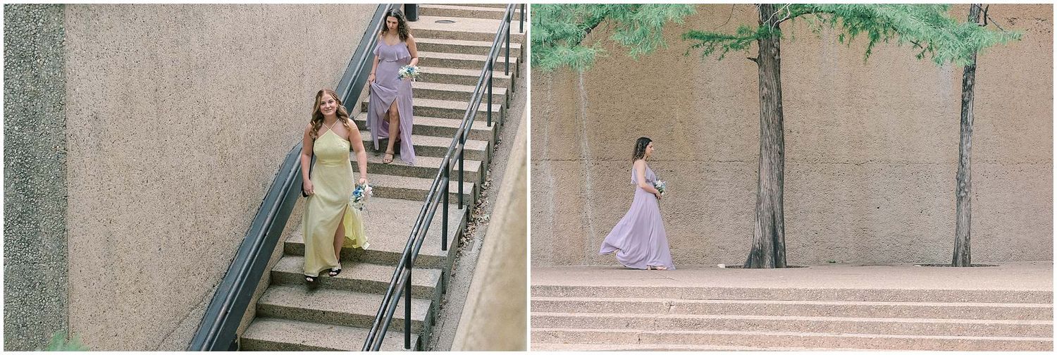 Stone steps and walkway leading to modern building entrance with trees lining the path.