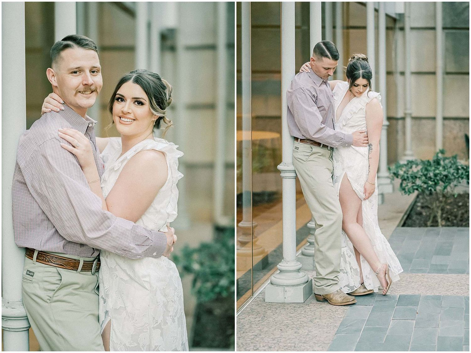 A couple in wedding attire embraces on a stone patio with elegant architecture in the background.