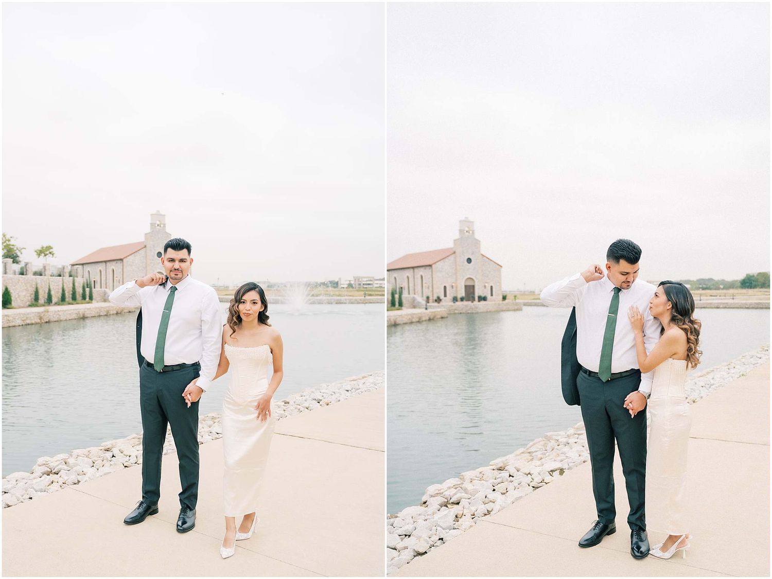 A couple in wedding attire poses together on a scenic waterfront with a cloudy sky backdrop.