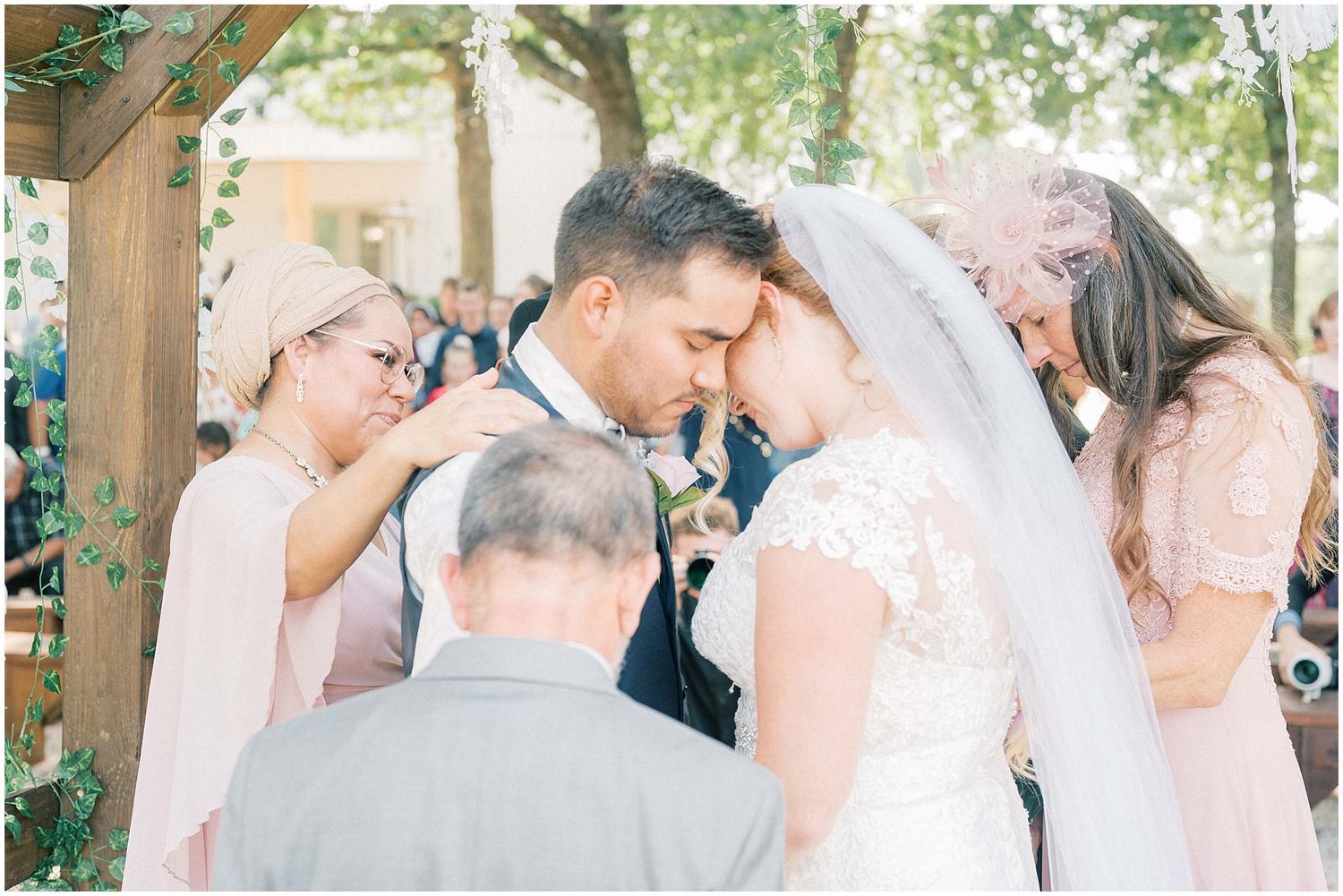 Romantic outdoor wedding ceremony moments captured in soft natural lighting.
