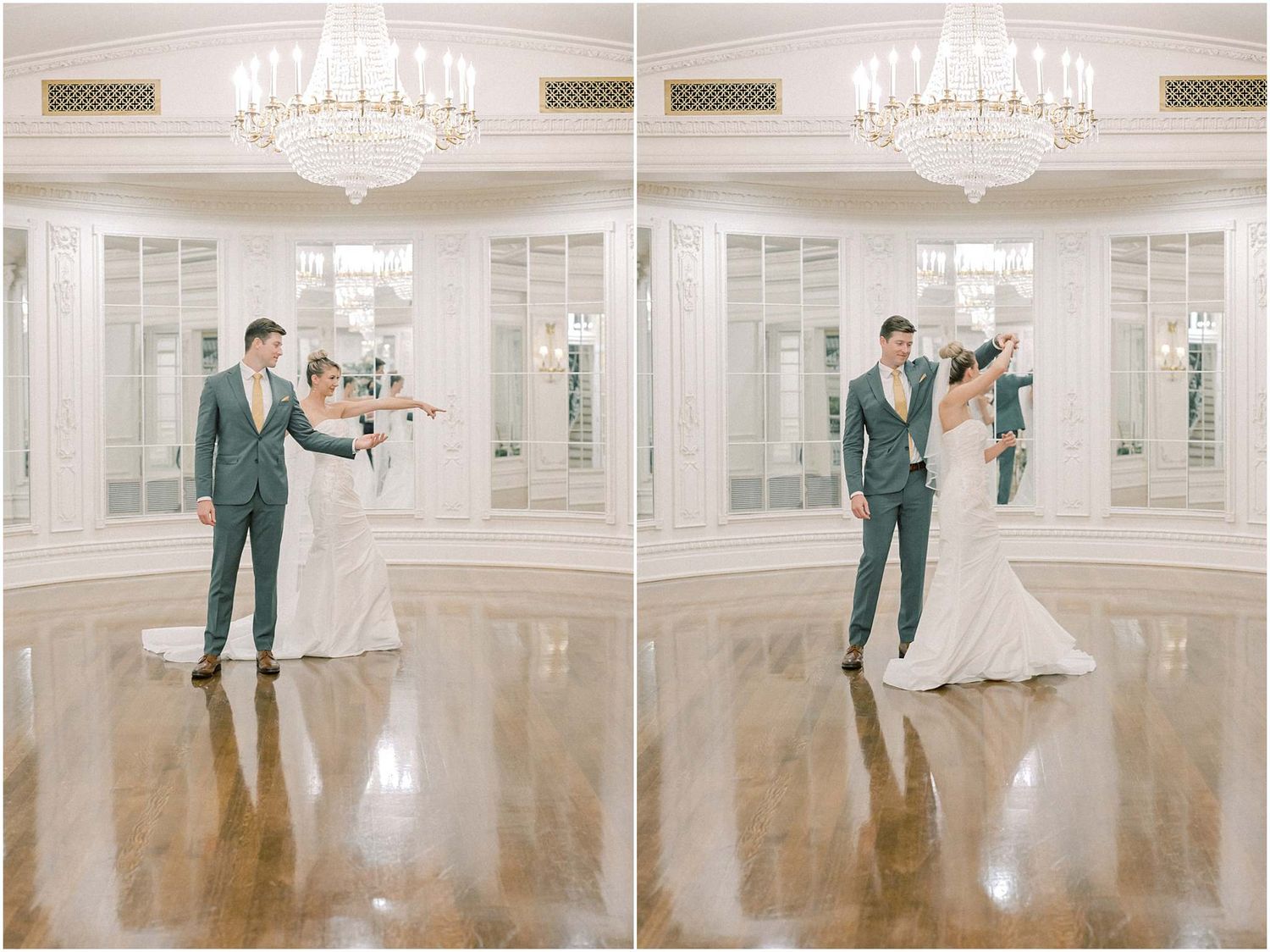 Wedding couple dancing in an elegant white ballroom with crystal chandeliers overhead.