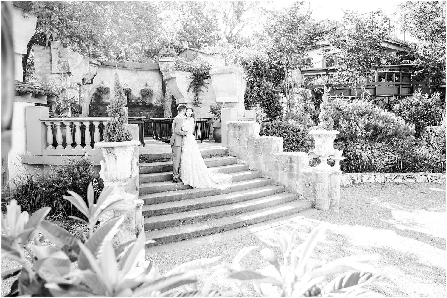 Elegant stone staircase and architecture creates a romantic outdoor setting.