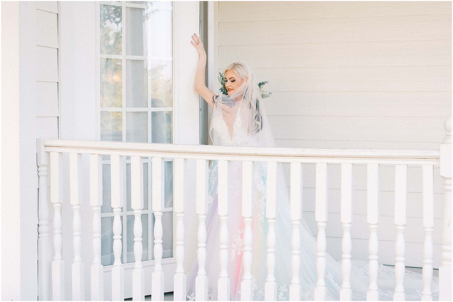 Bright white balcony railing with soft natural light streaming through windows.