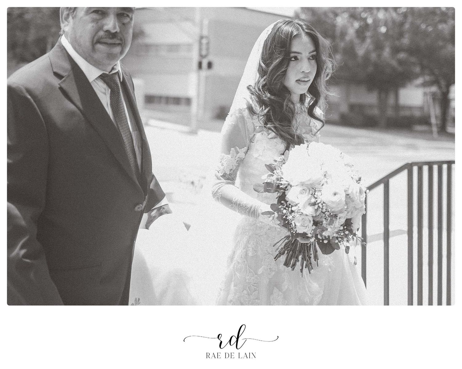 Black and white outdoor wedding portraits with natural lighting.