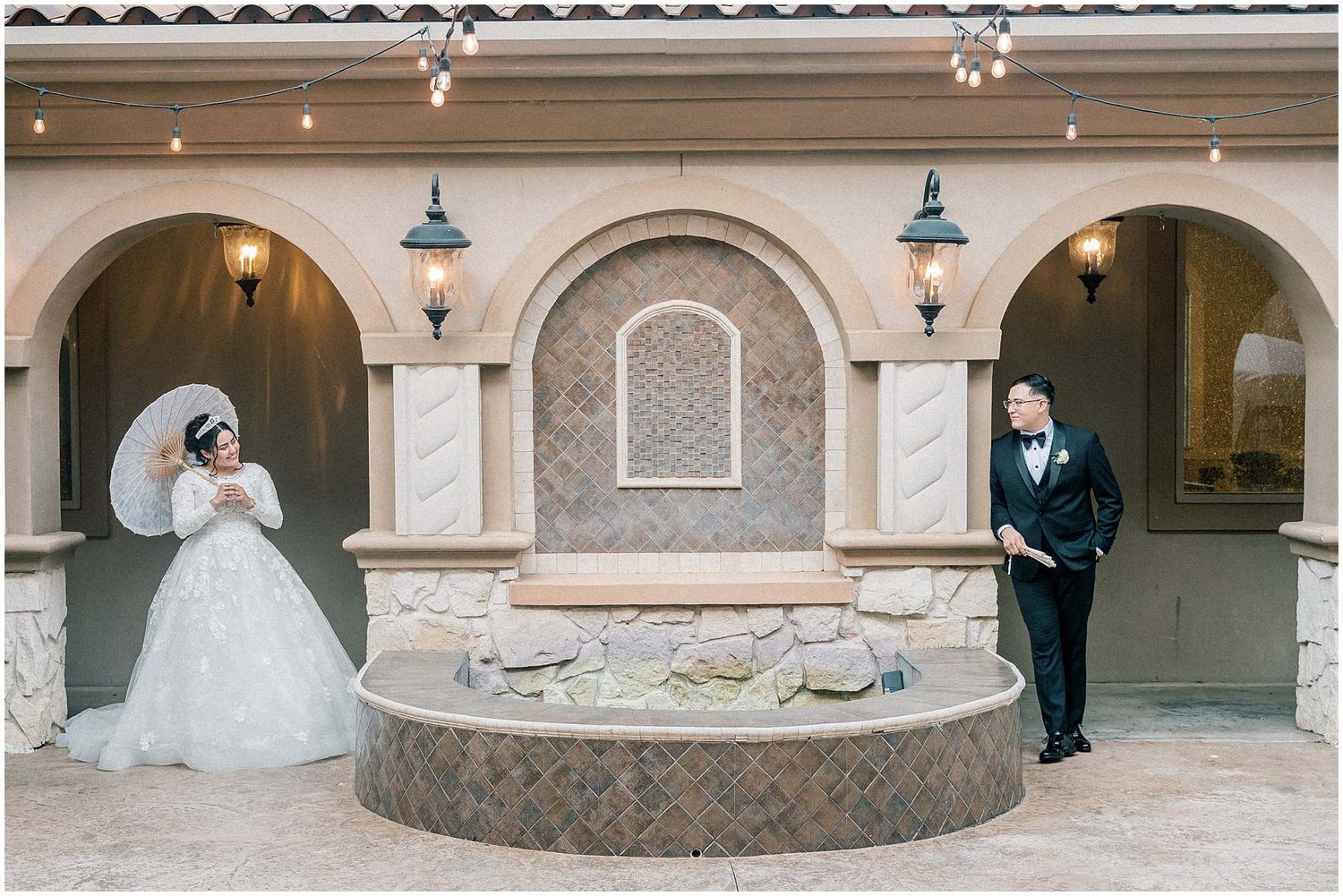 Elegant wedding venue with arched doorways and classic architectural details.