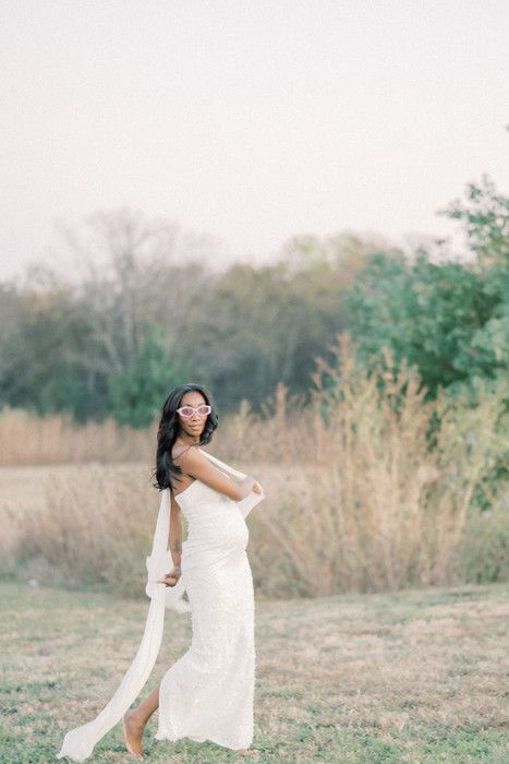 Ethereal white dress movement captured in a series of romantic outdoor poses among tall grass.