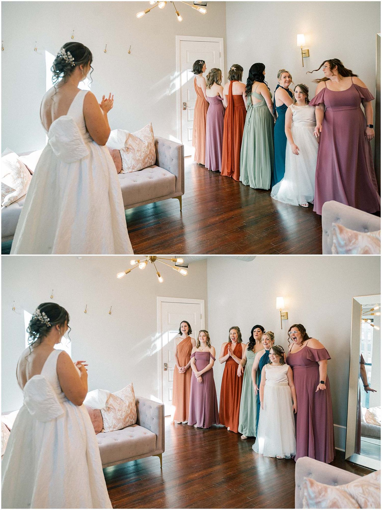 Bridesmaids in pastel dresses react to seeing the bride in her wedding gown.