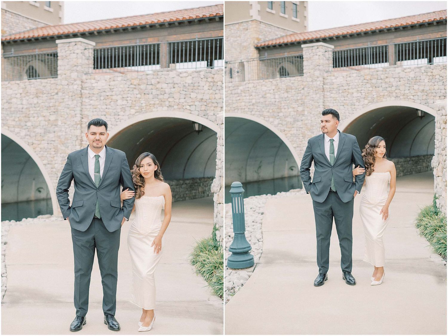 Couple in formal attire poses under stone archways at a Mediterranean-style venue during a photo session.
