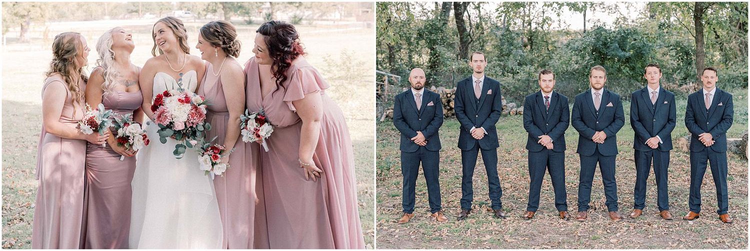Wedding party poses outdoors with bridesmaids in pink and groomsmen in navy suits.