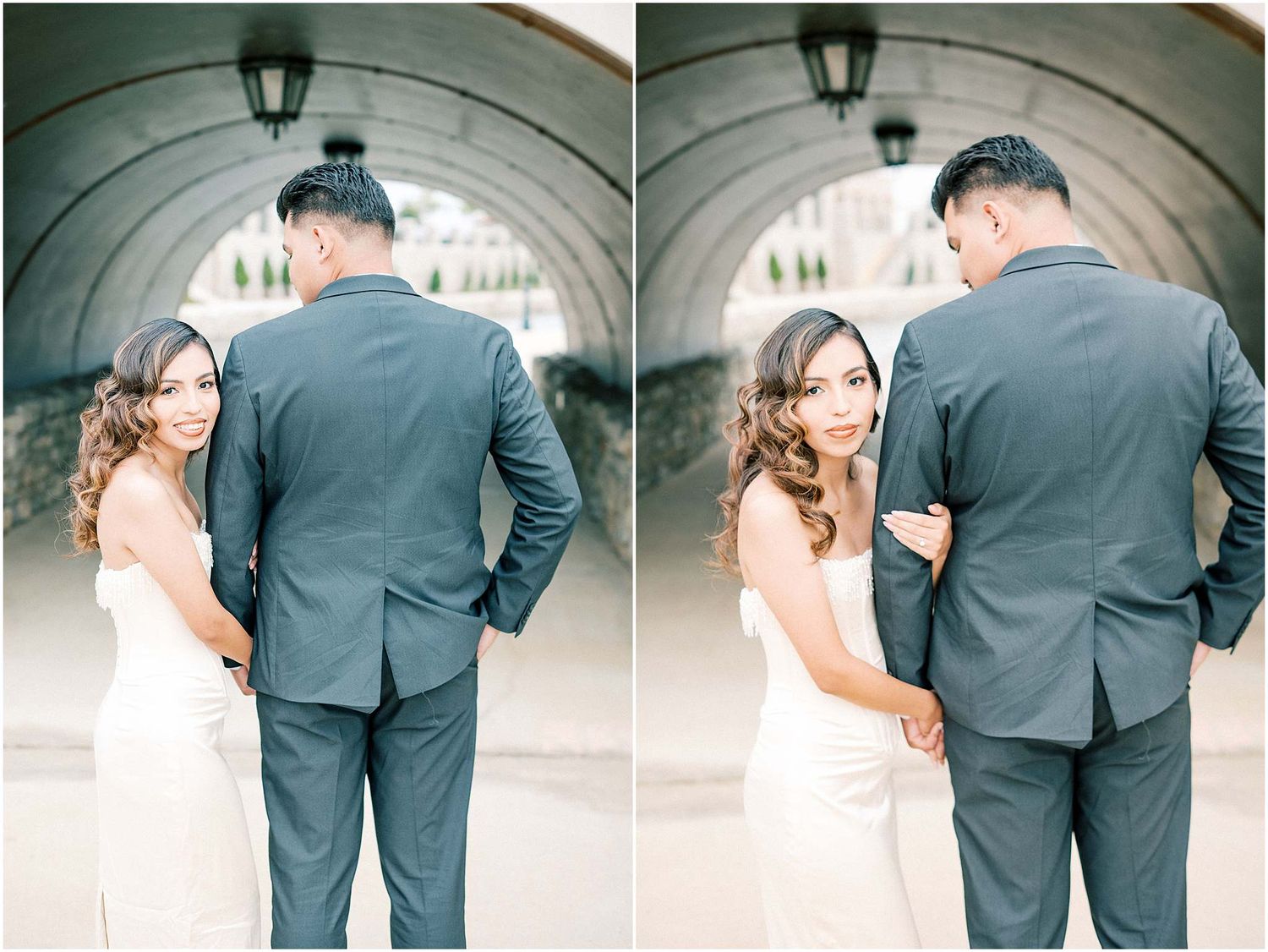 A couple shares a romantic first look moment under a stone archway during their wedding photoshoot.