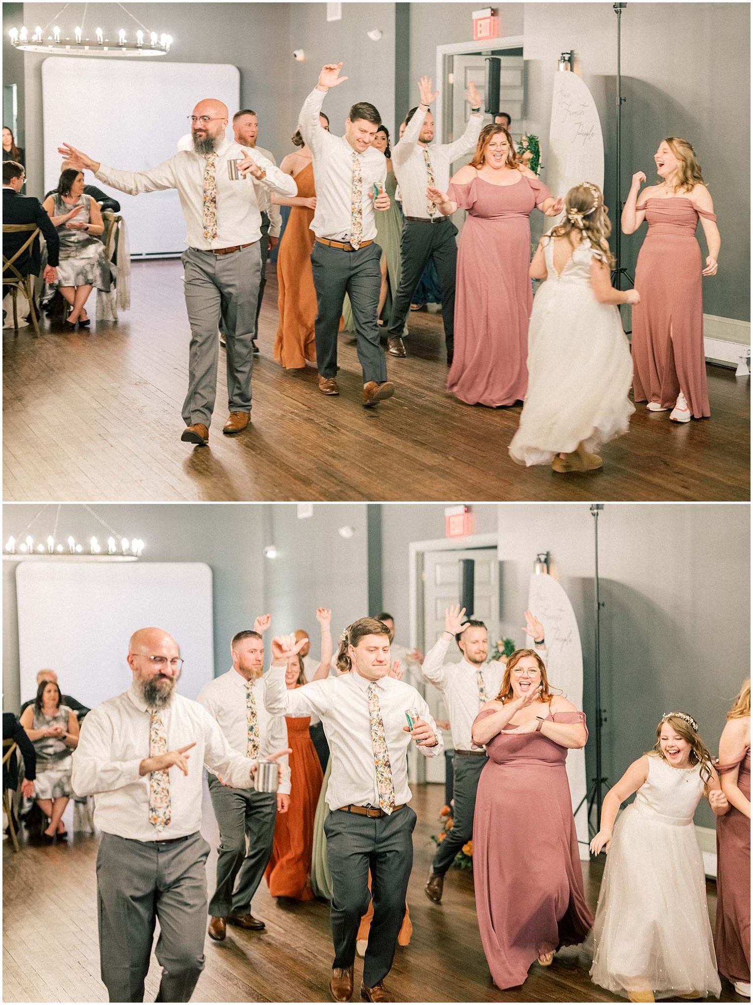 Wedding party dancing in a modern venue with bridesmaids in dusty rose dresses.