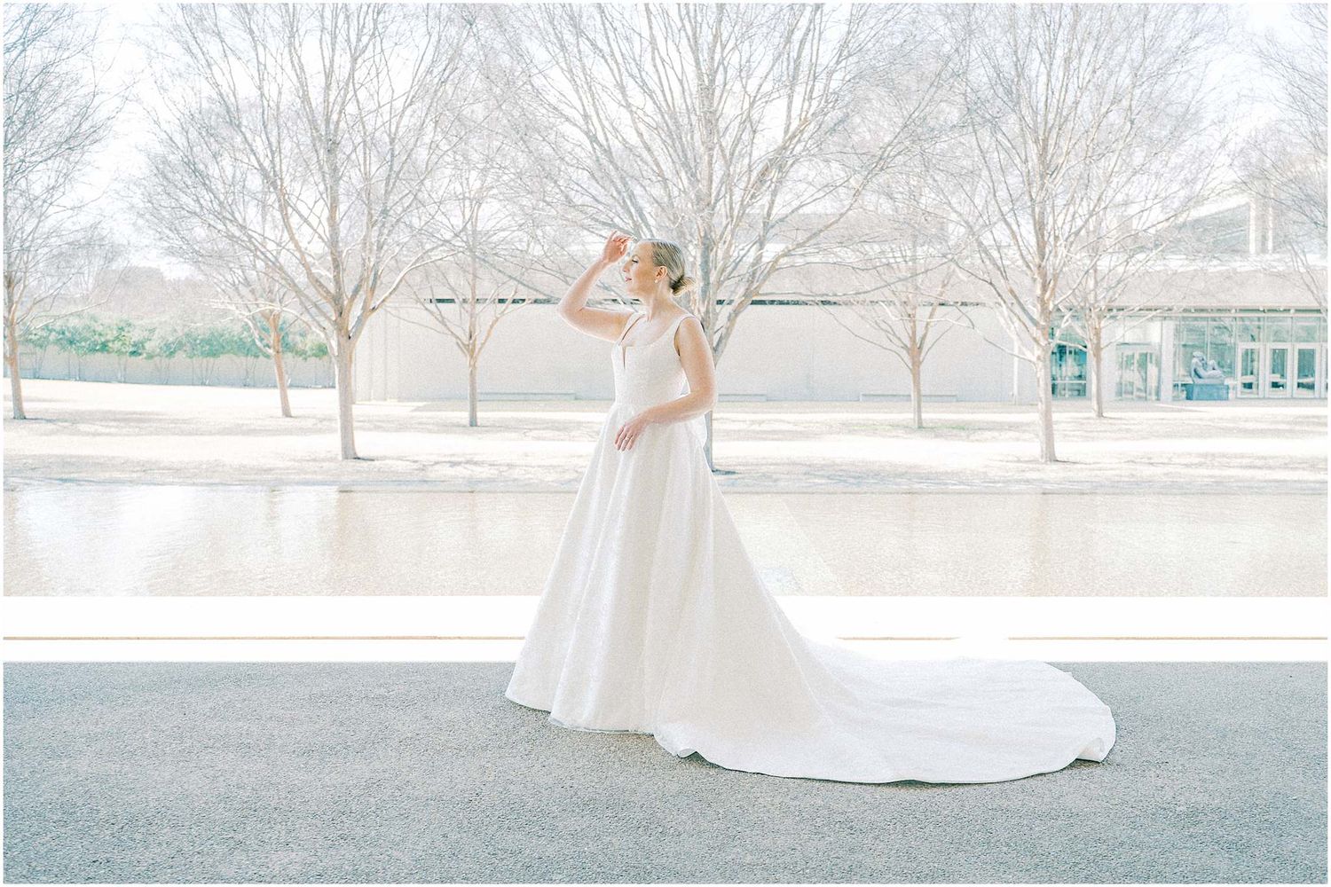 Series of bridal portraits showing movement of a classic white ballgown against urban backdrop.