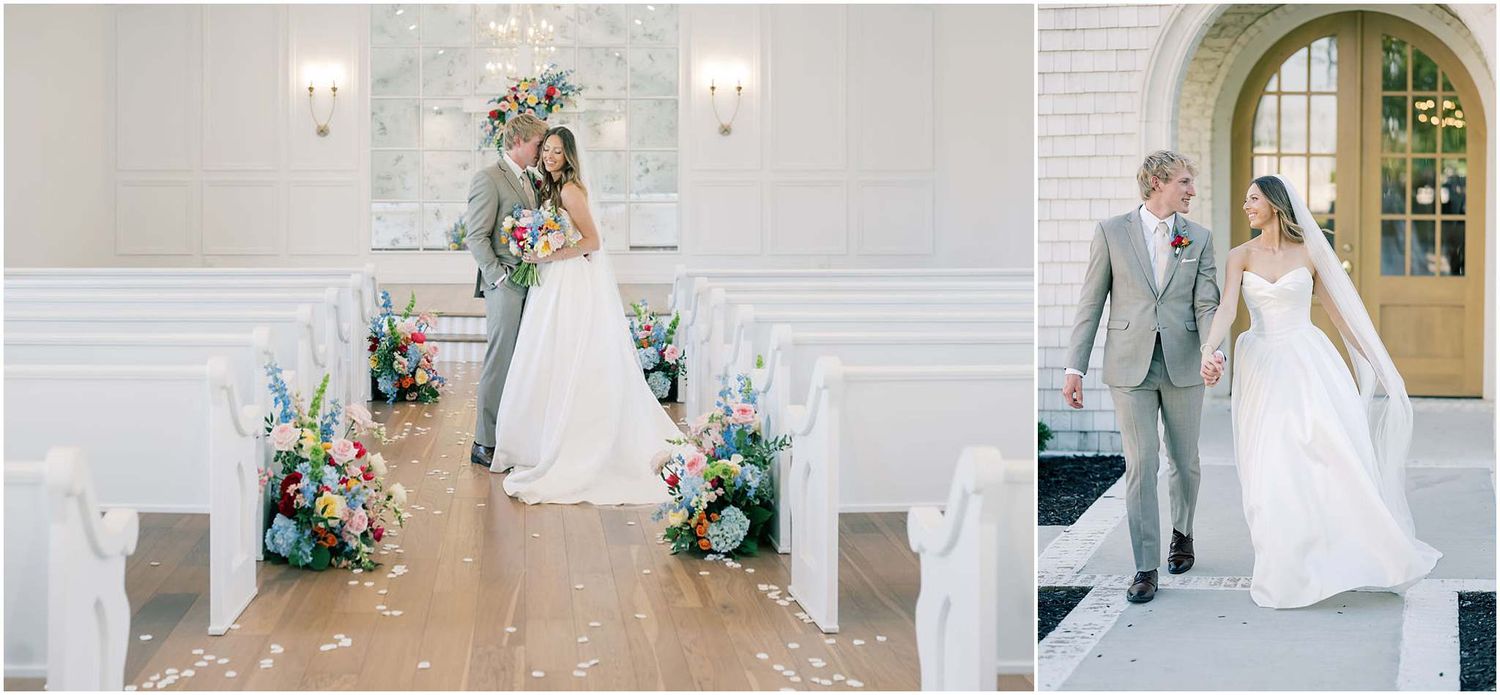 Newlyweds share a romantic moment and walk hand-in-hand past white pews adorned with vibrant floral arrangements.