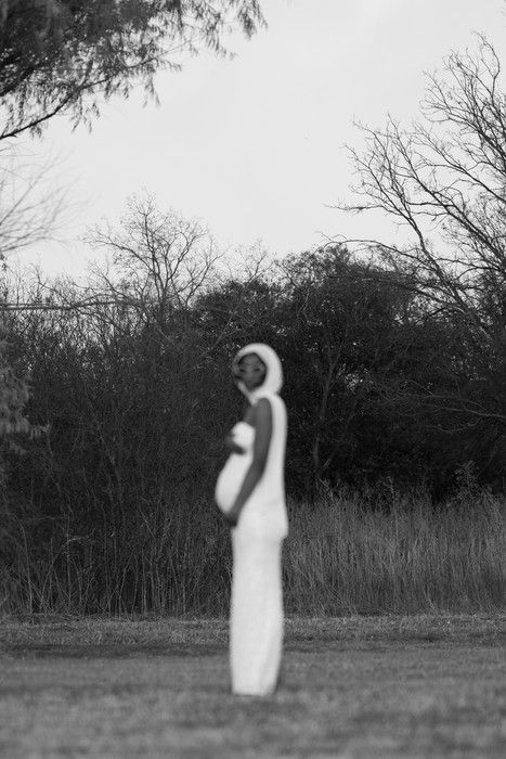 Ethereal black and white maternity silhouettes showing movement in nature.