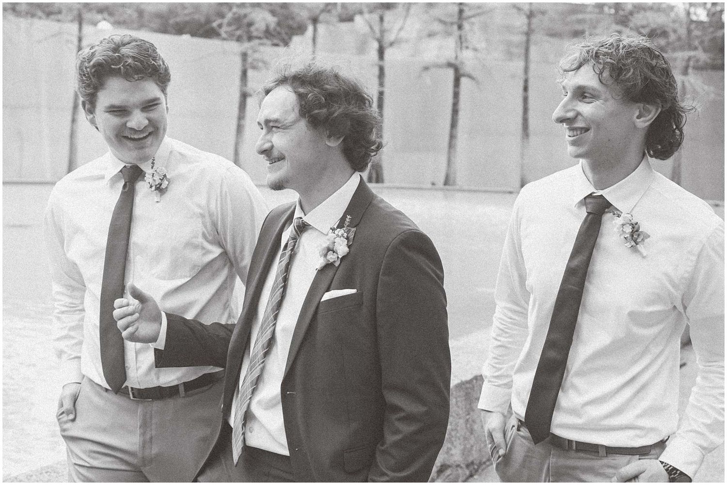 A series of black and white photographs showing people in formal attire laughing and conversing at a social gathering.