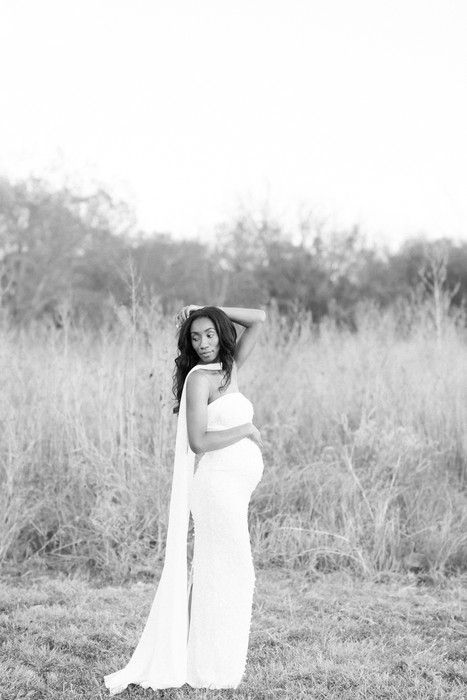 Dreamy monochrome photography sequence showing a person in white moving elegantly through tall grass.