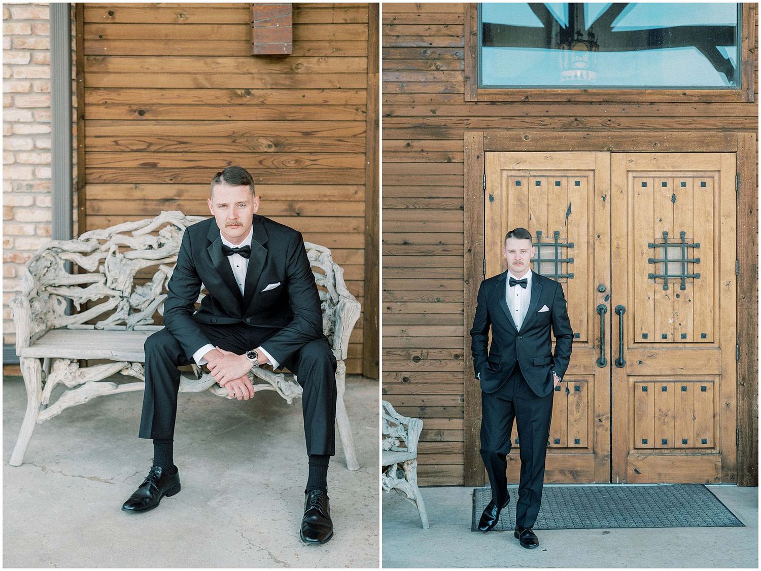 Groom and groomsmen in black tuxedos posing against rustic wooden doors.