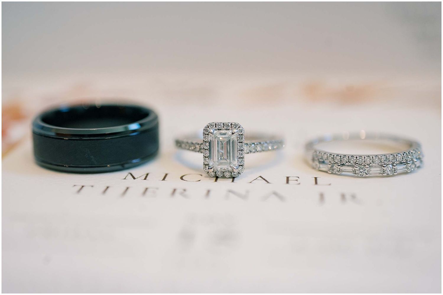 Elegant diamond engagement ring and wedding bands arranged in artistic macro detail shots on white surfaces.