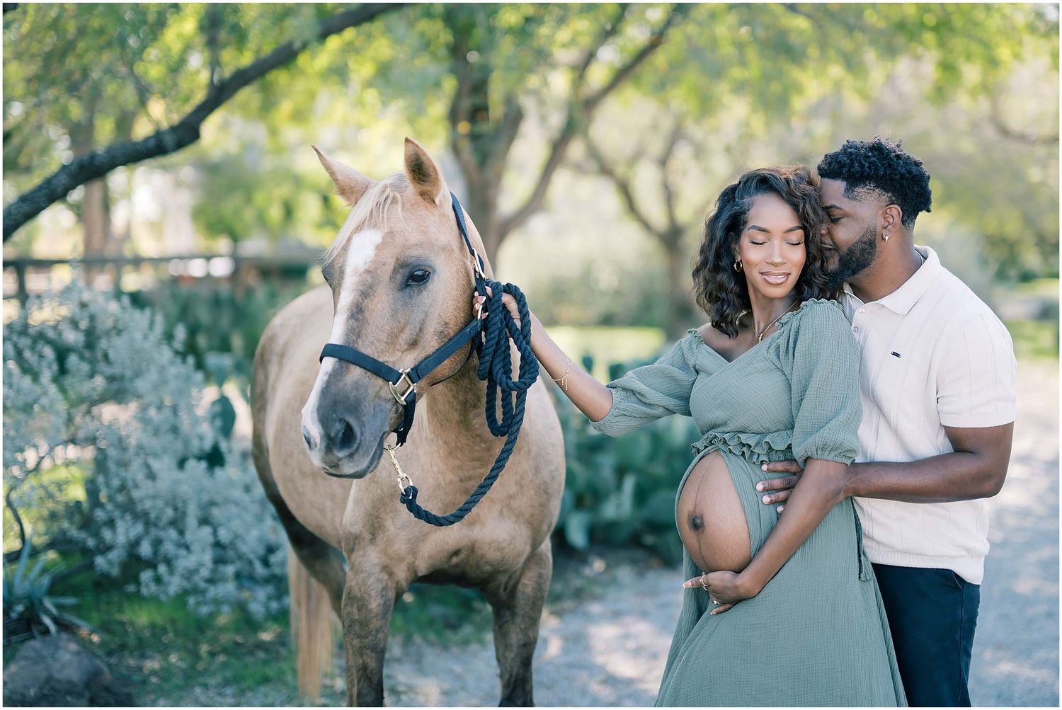 A couple shares intimate moments during their engagement photos with a horse in a park setting.
