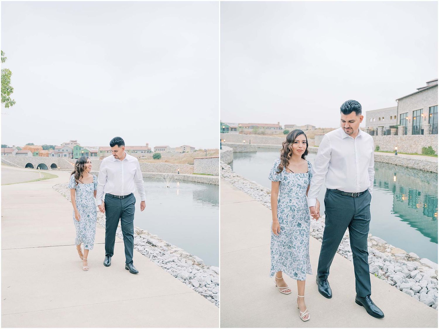 Couple walks hand in hand along waterfront path on bright sunny day.