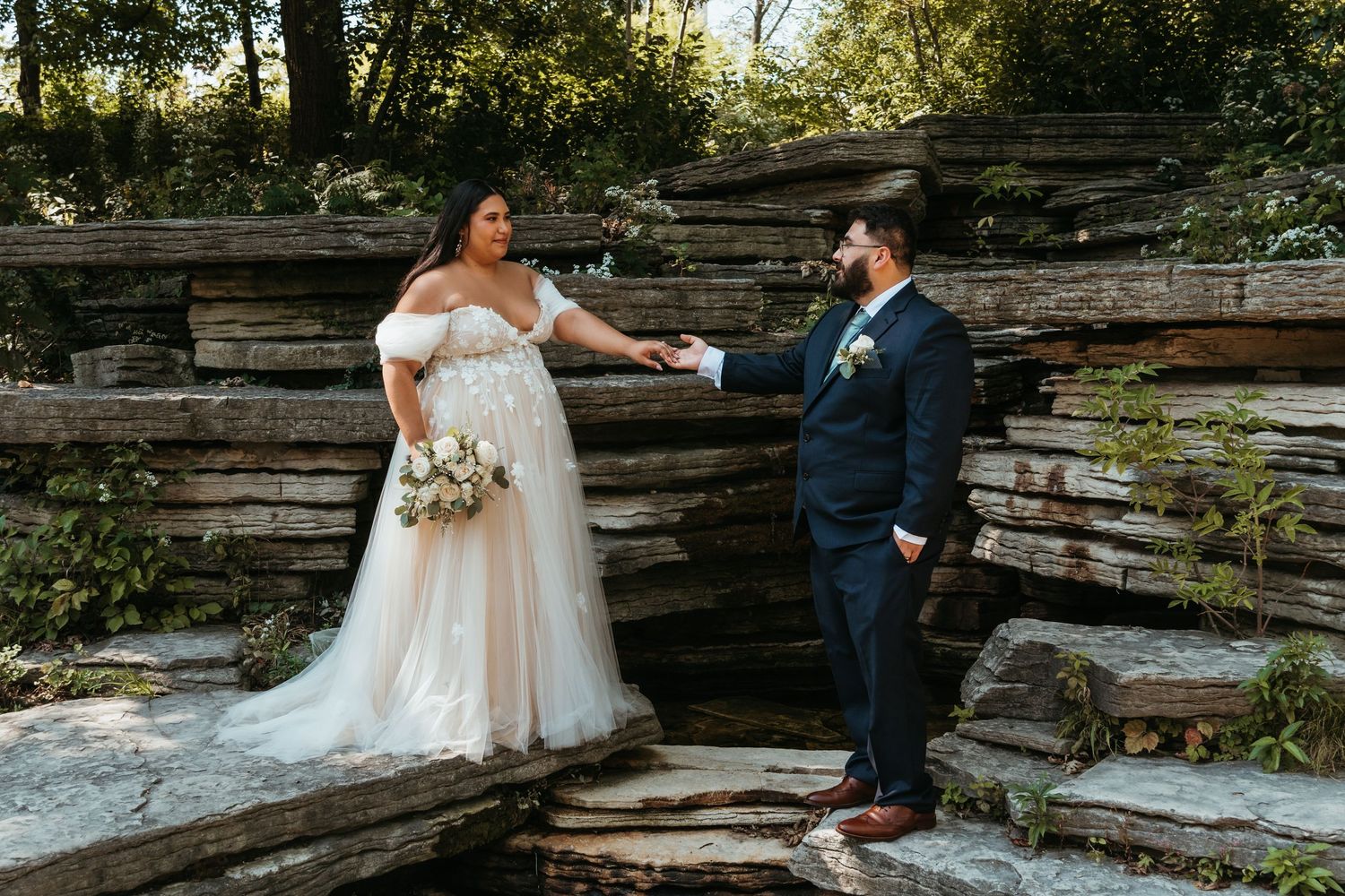 A wedding couple at Alfred Caldwell Lily Pool in Chicago, Illinois