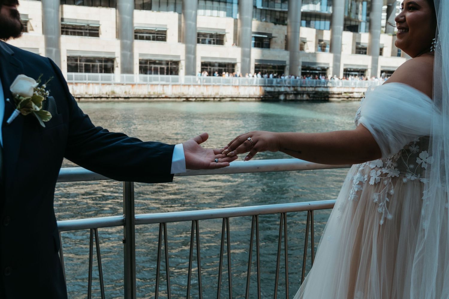 A wedding couple at Chicago Riverwalk in Chicago, Illinois