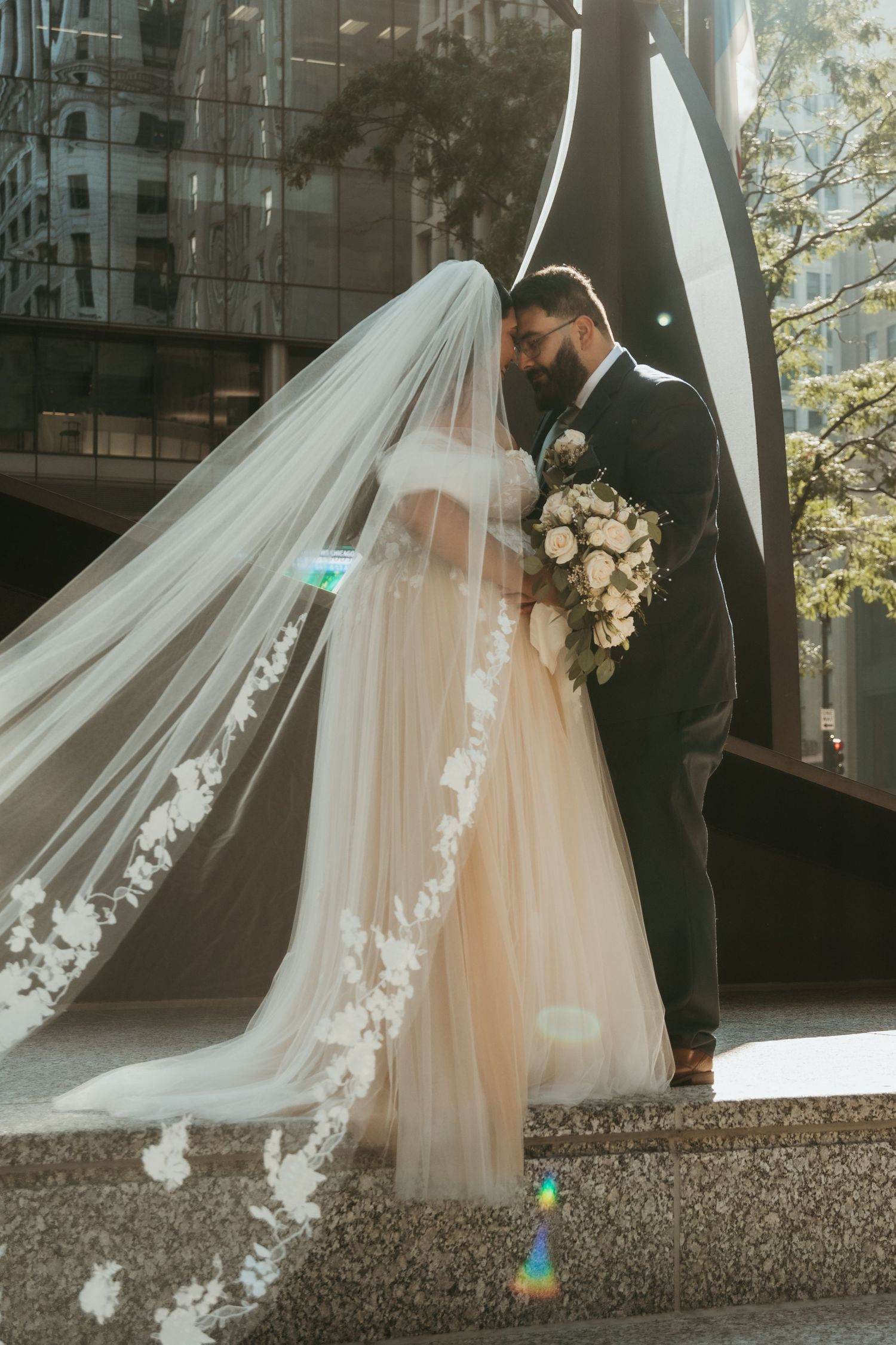 A wedding couple at Richard J. Daley Center in Chicago, Illinois
