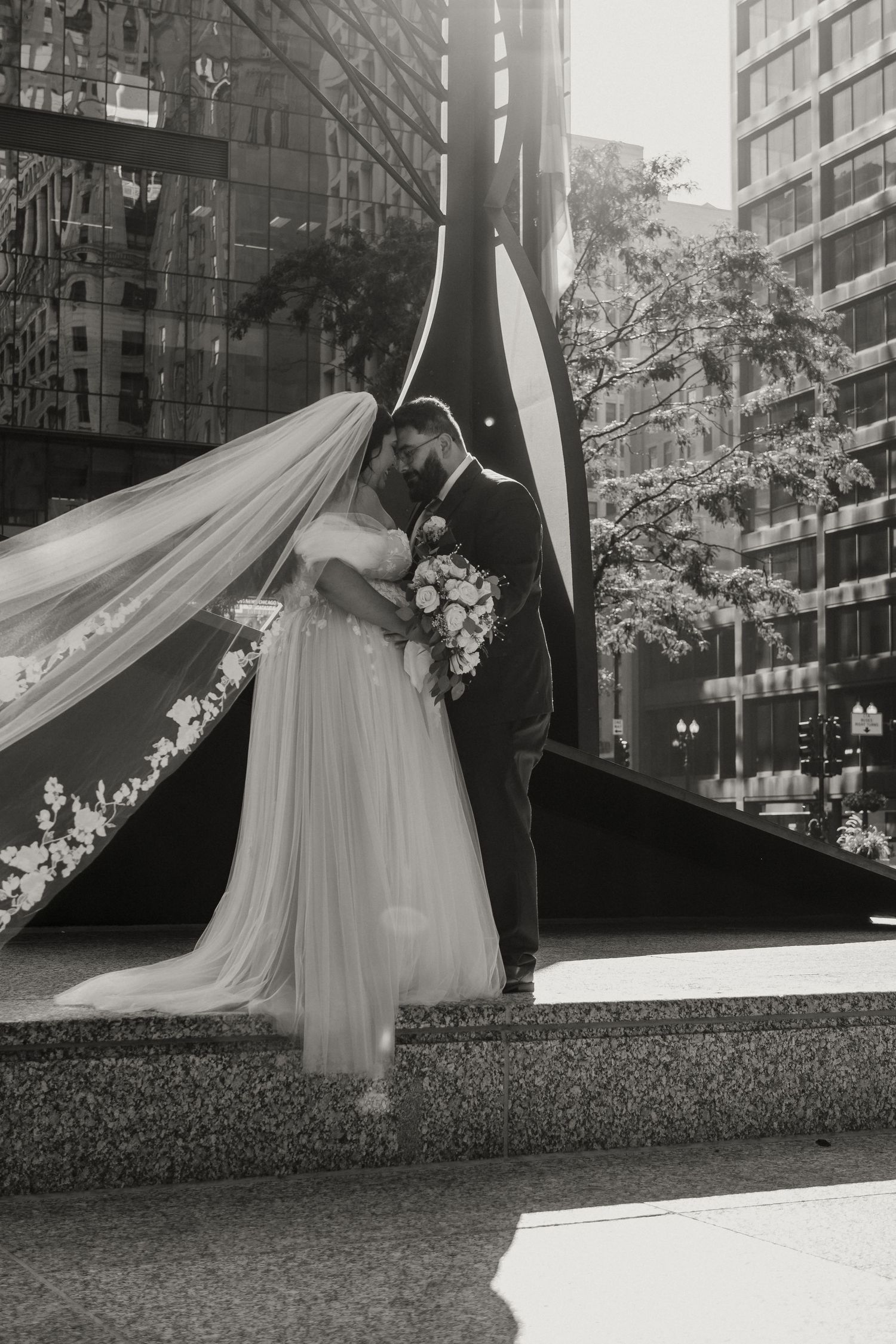 A wedding couple at Richard J. Daley Center in Chicago, Illinois