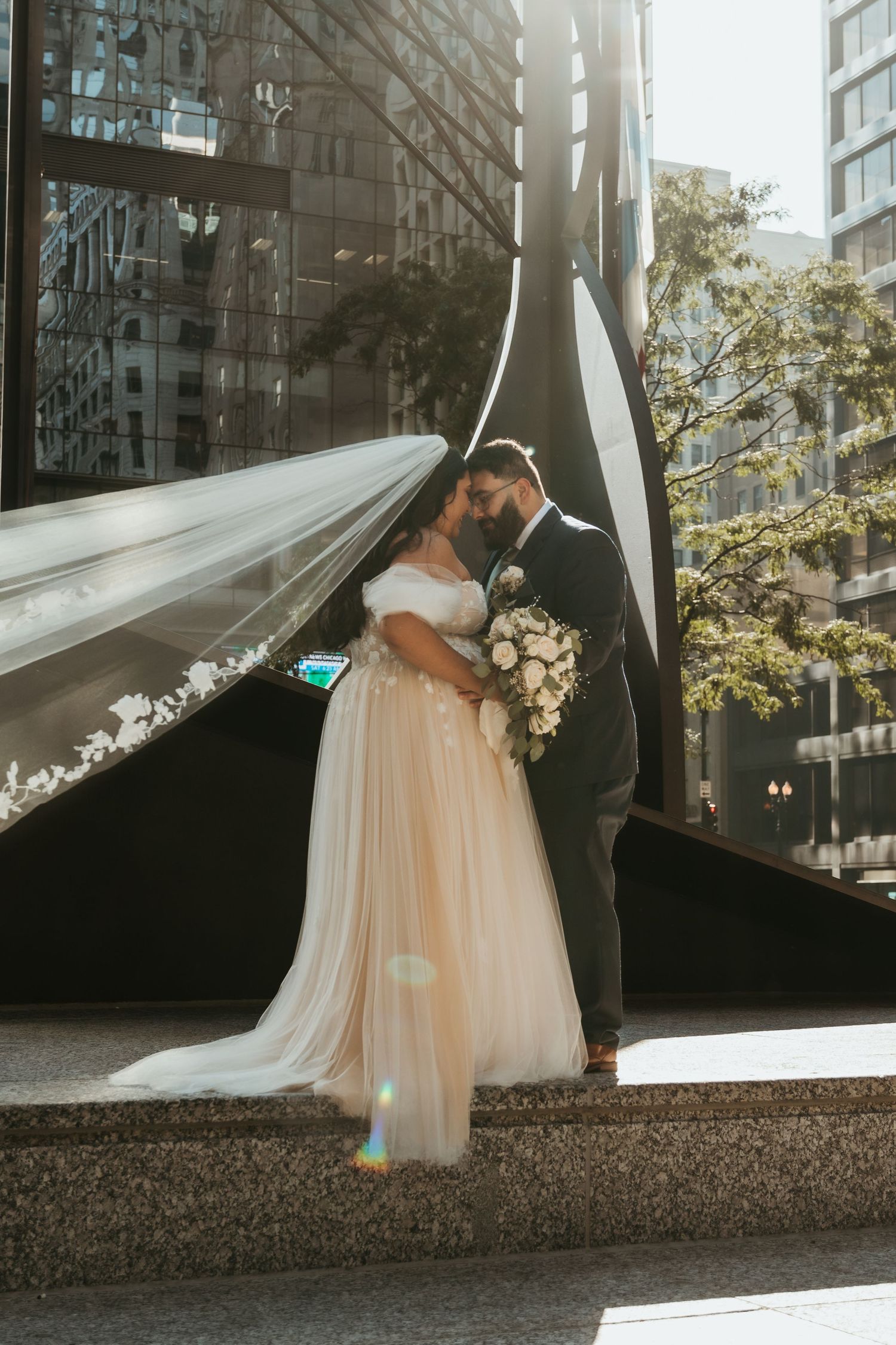 A wedding couple at Richard J. Daley Center in Chicago, Illinois