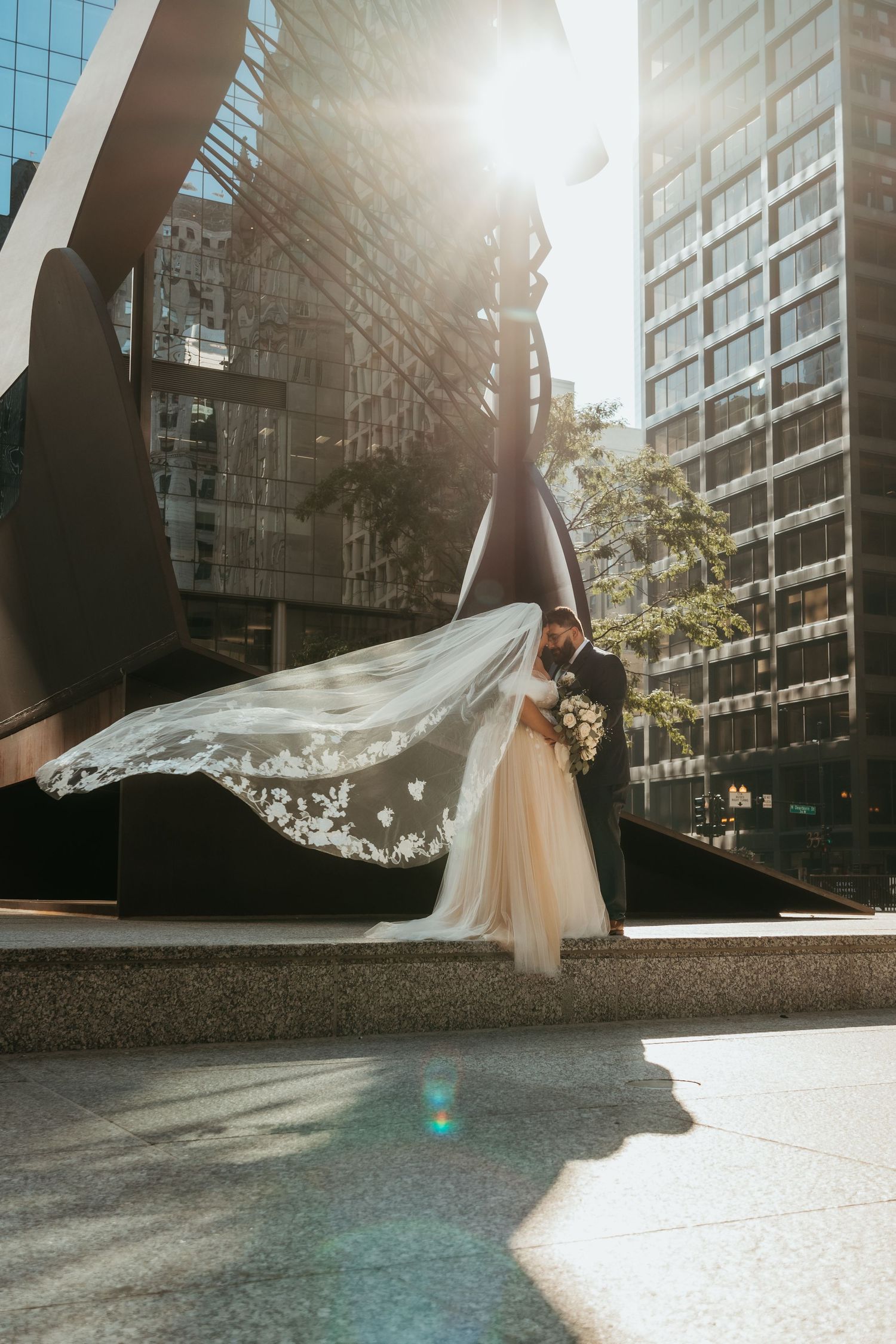A wedding couple at the Richard J. Daley Center in Chicago, Illinois