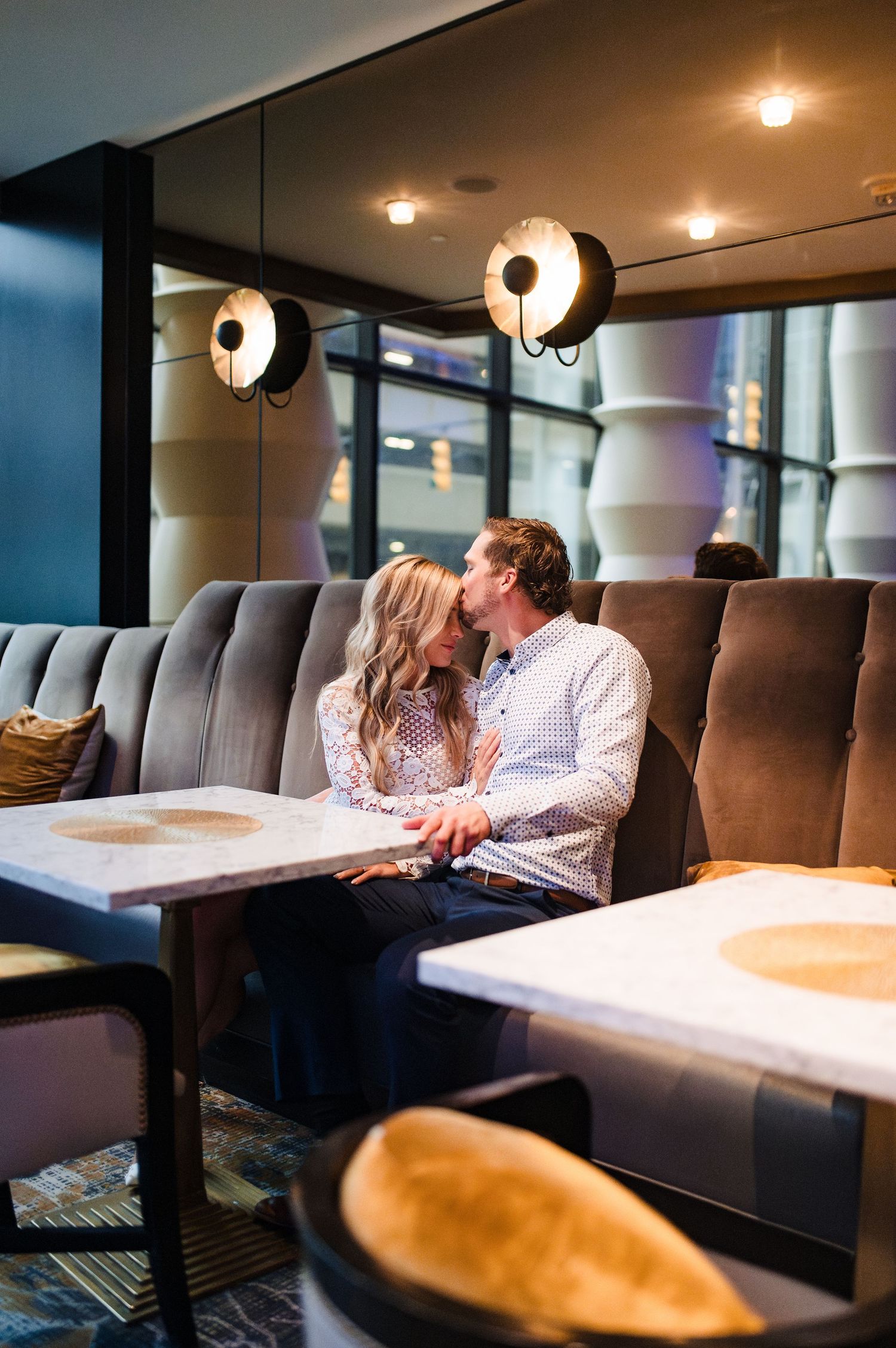 Cozy restaurant booth scene with ambient lighting and modern decor.