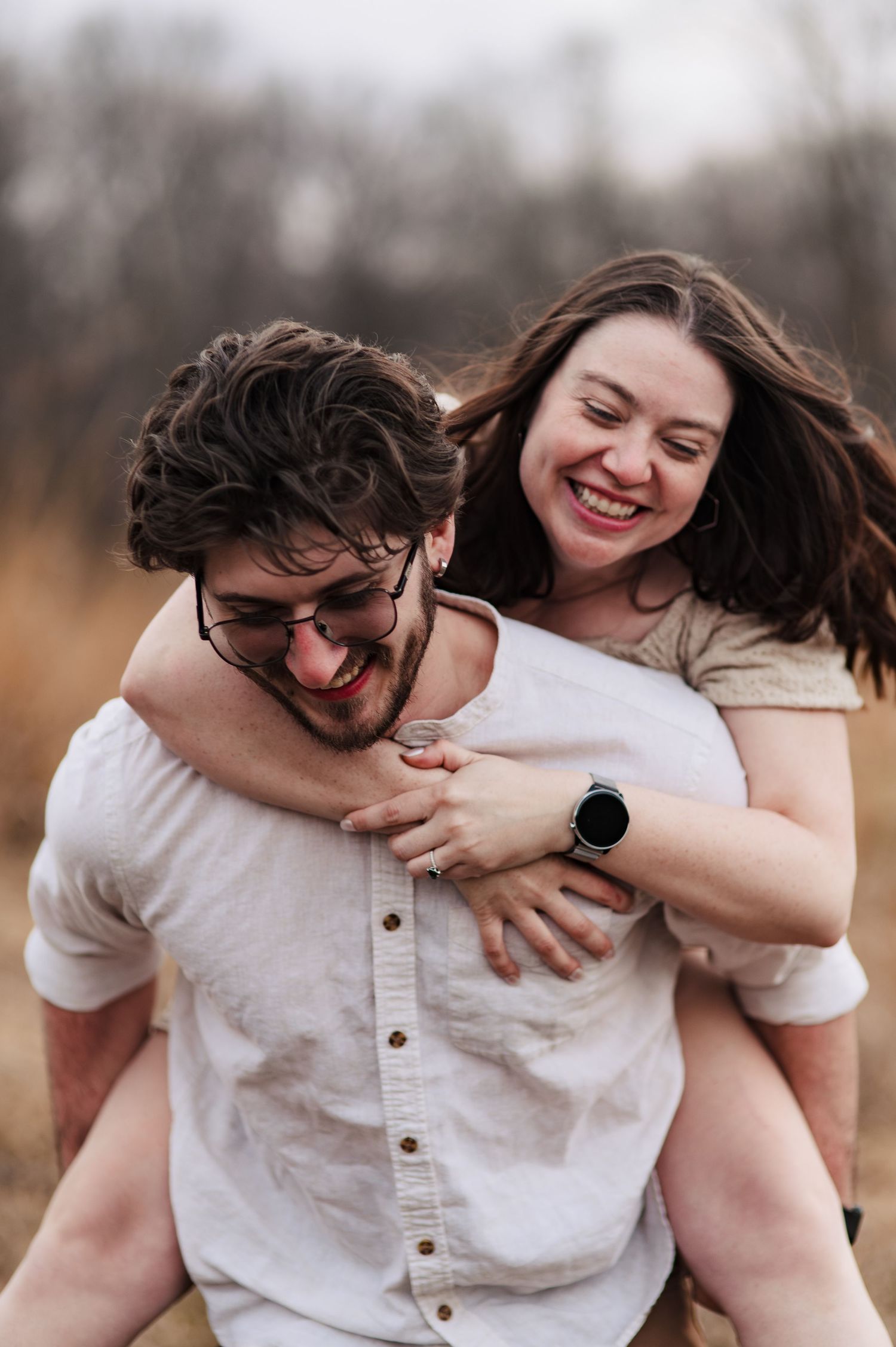 A couple shares playful piggyback moments in a series of candid outdoor photos.
