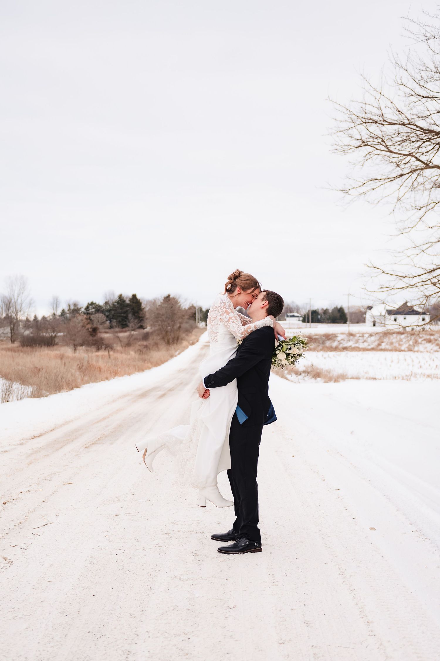 Winter wedding photography sequence showing couple embracing on snow-covered landscape.