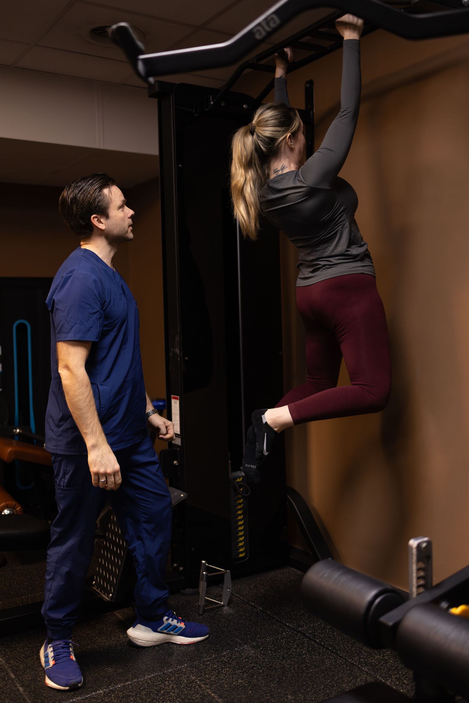 A sequence showing a workout routine where two people demonstrate pull ups