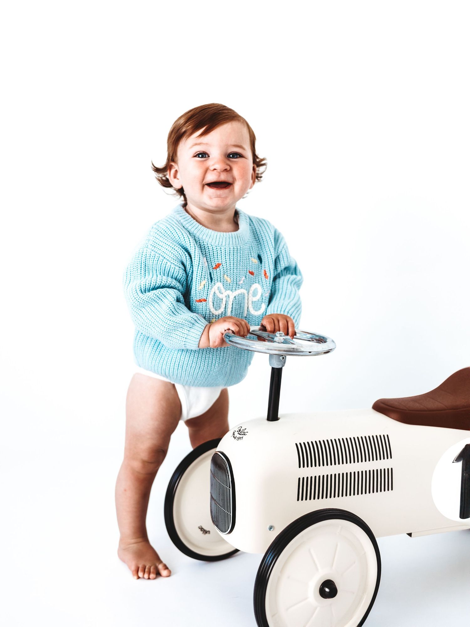 Smiling baby in blue 