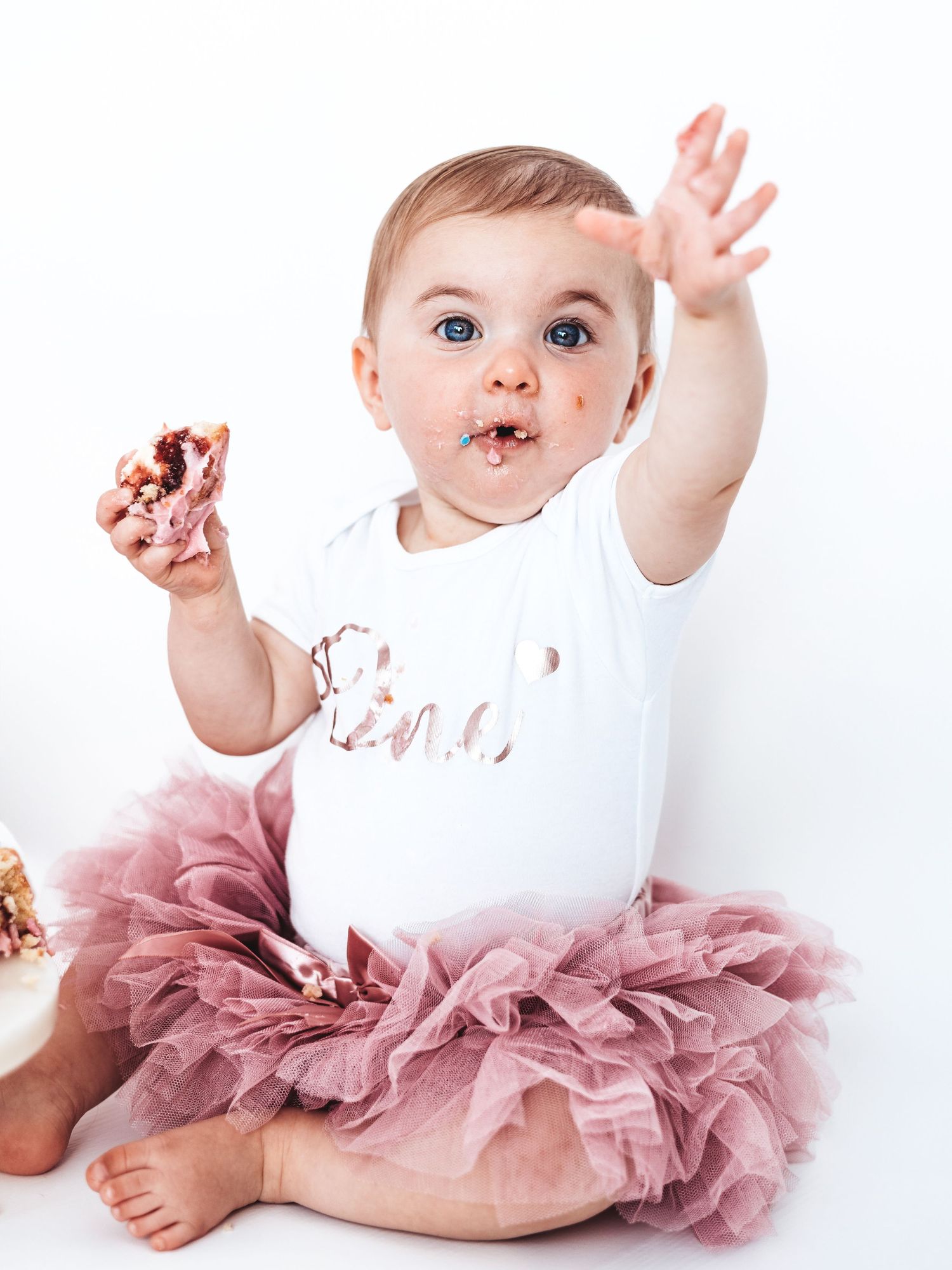 Baby girl in pink tutu and white \