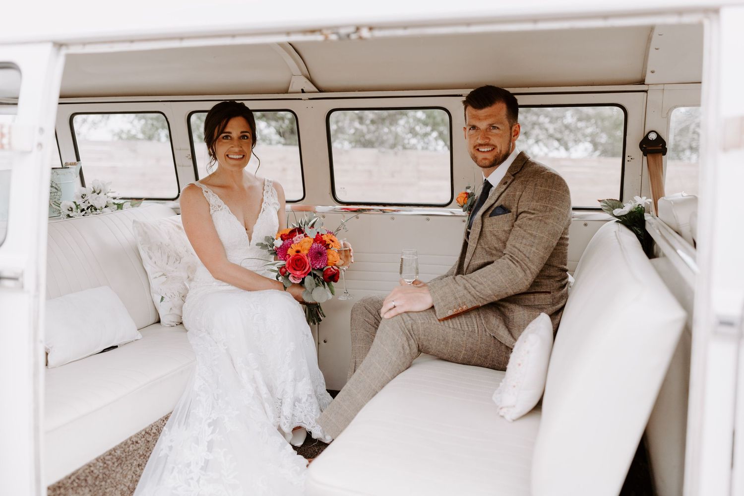 Classic white vintage wedding car interior with elegant details.