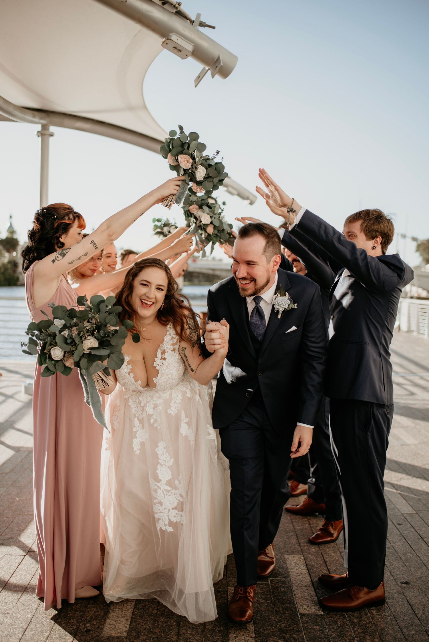 Wedding party at Tampa River Walk wedding Captured by Willow + Vine Photography