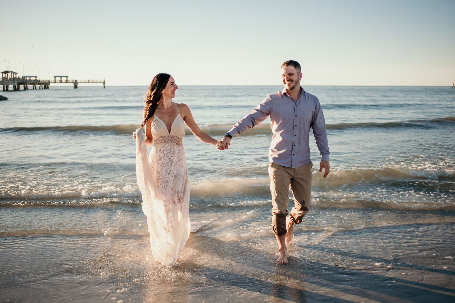Couple walking on Fort De Soto Beach Captured by Willow + Vine Photography