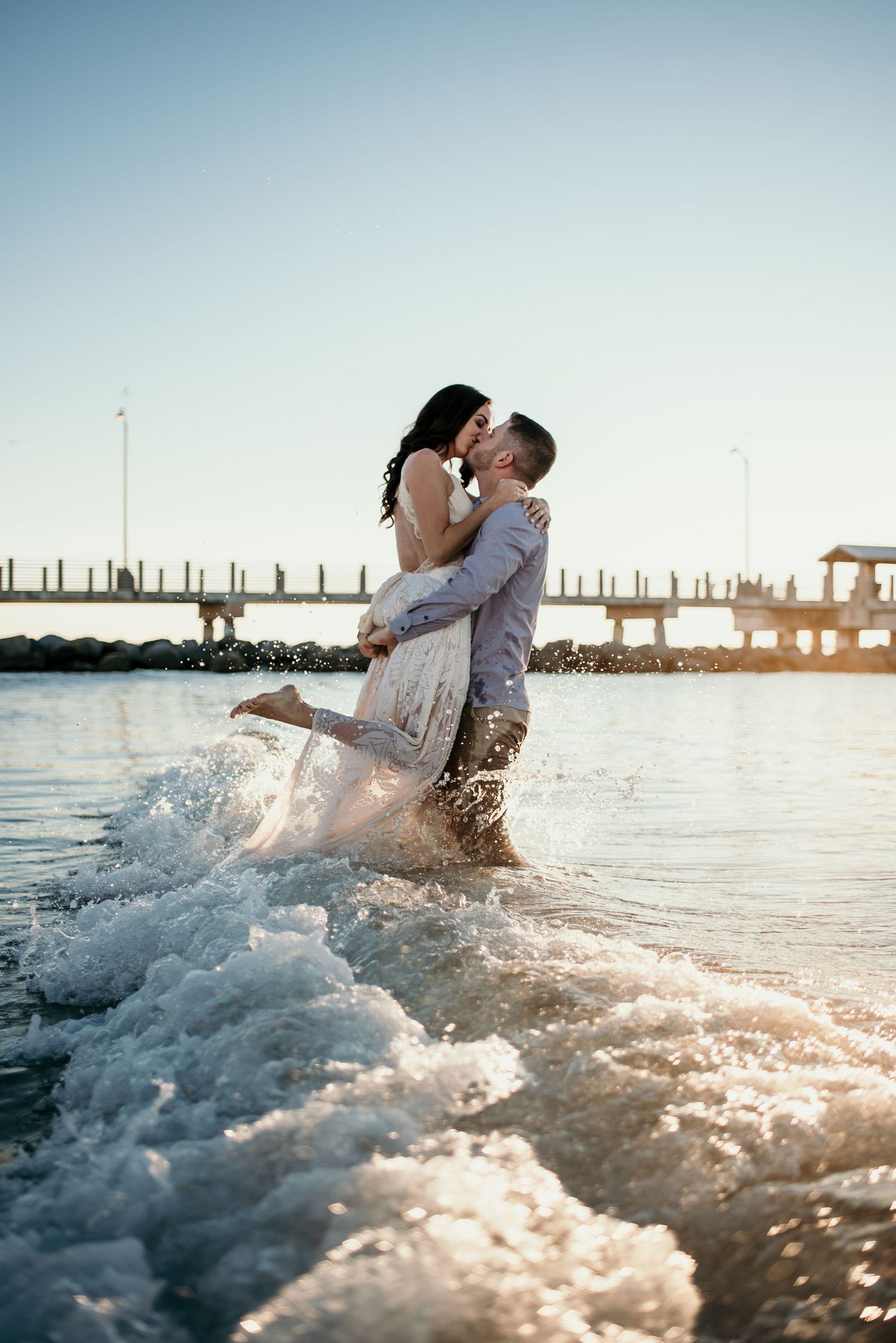 Couple on Fort De Soto Beach Captured by Willow + Vine PhotographyCaptured by Willow + Vine Photography