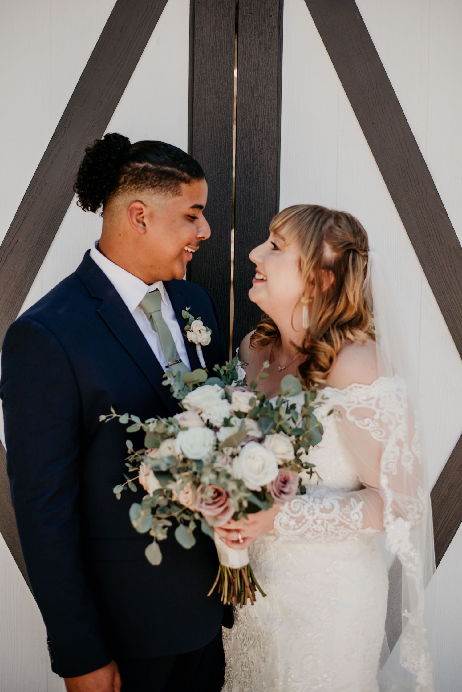 Romantic wedding photo of newlyweds taken by Willow + Vine Photography