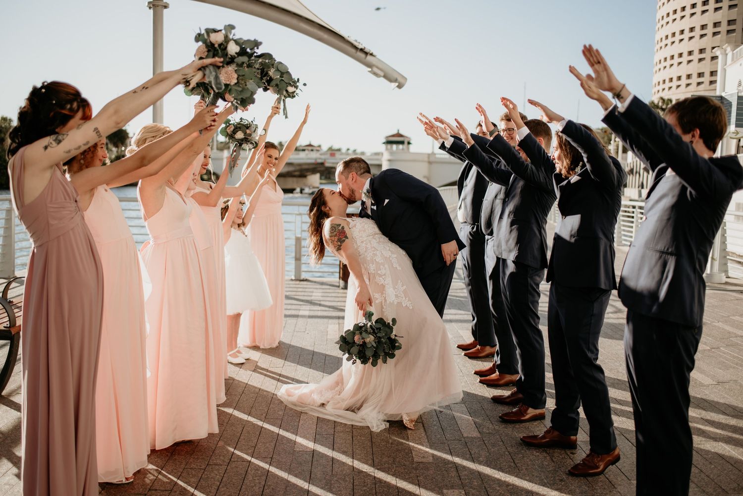 Wedding party on Tampa River Walk taken by Willow + Vine Photography