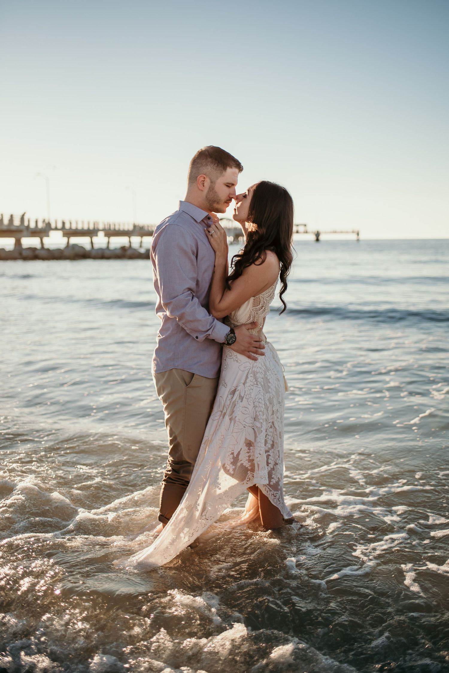 Couple walking on Fort De Soto Beach Captured by Willow + Vine Photography