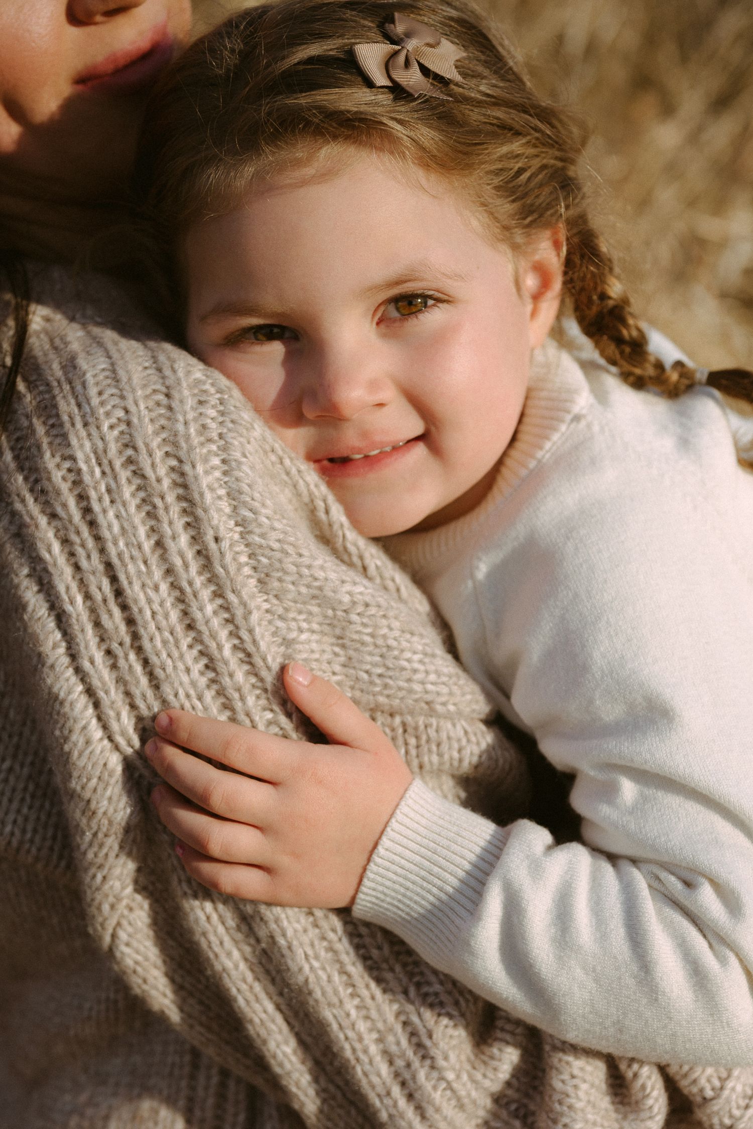 Close-up sequence showing sweet expressions and cuddles in warm natural lighting.