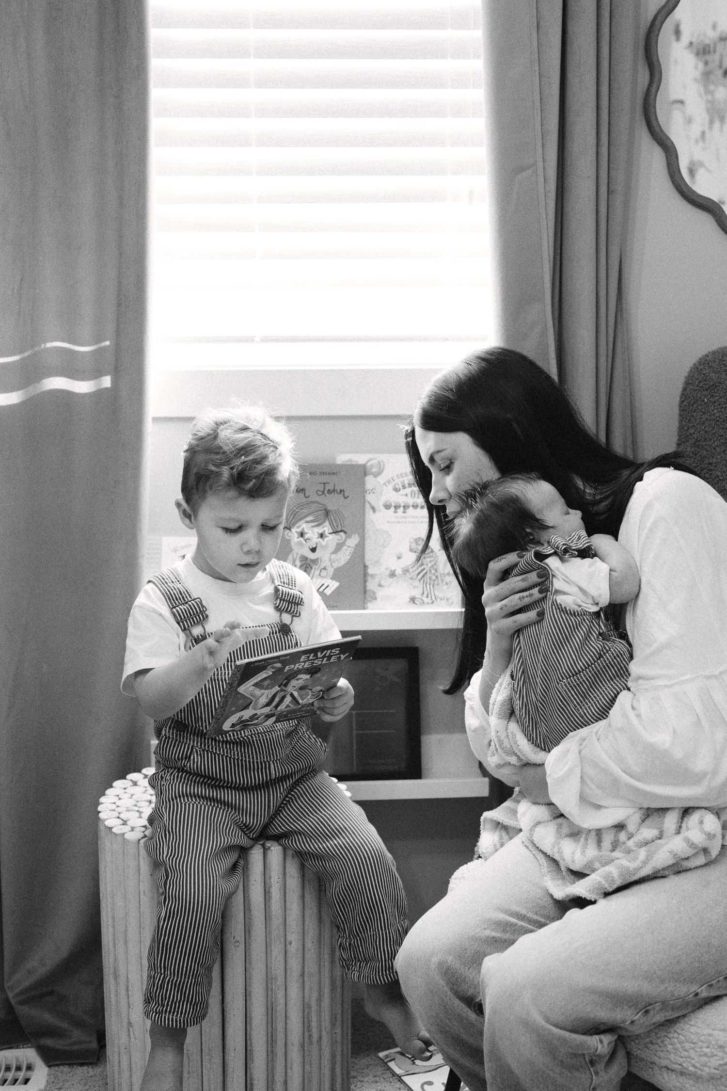 Series of candid shots showing tender moments between adults and a baby in a living room.