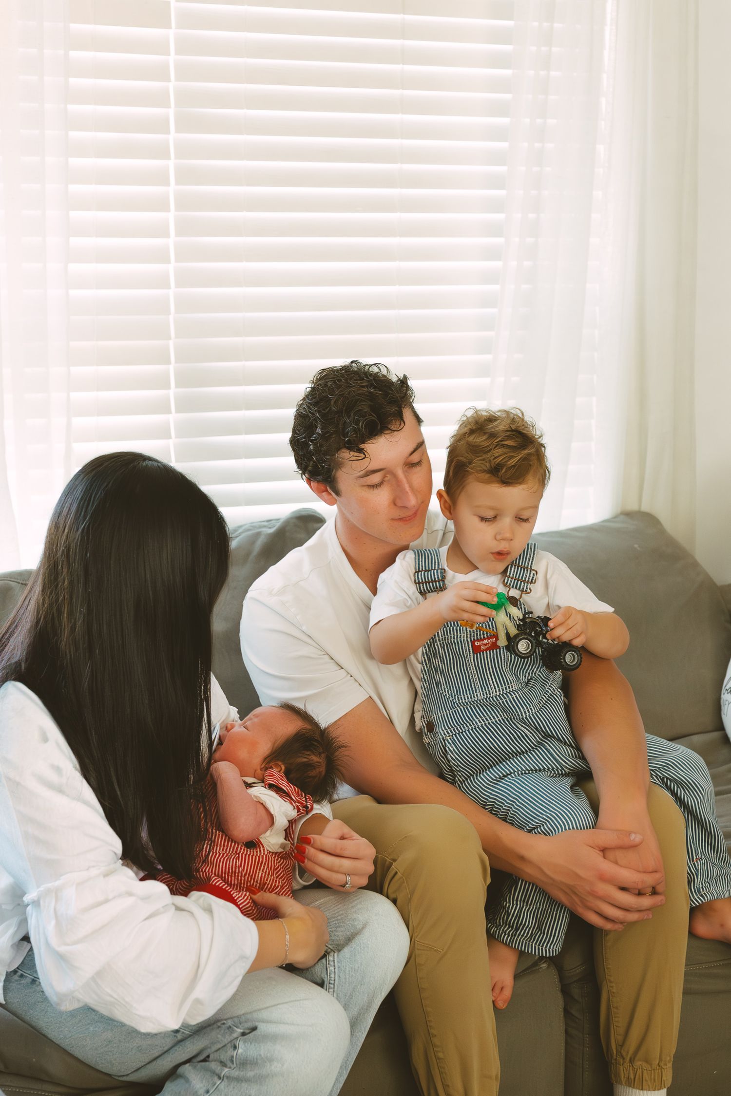 A series of four connected photos showing tender moments between parent and child sitting on a couch.