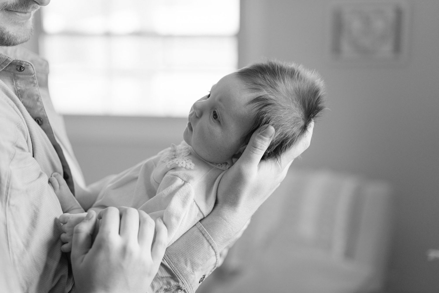 Black and white portrait of family bonding moment.