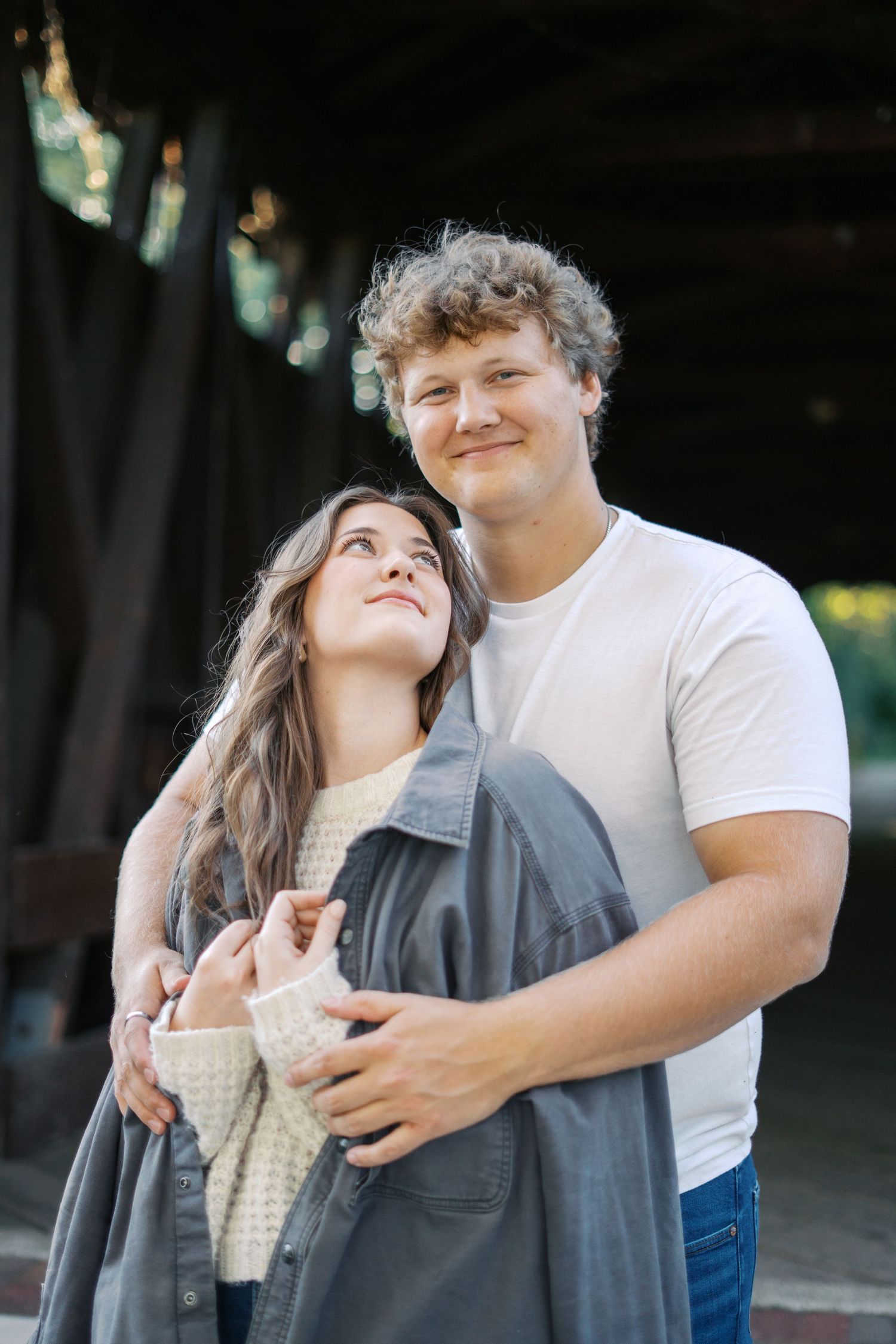 Happy couple sharing a joyful moment together outdoors.
