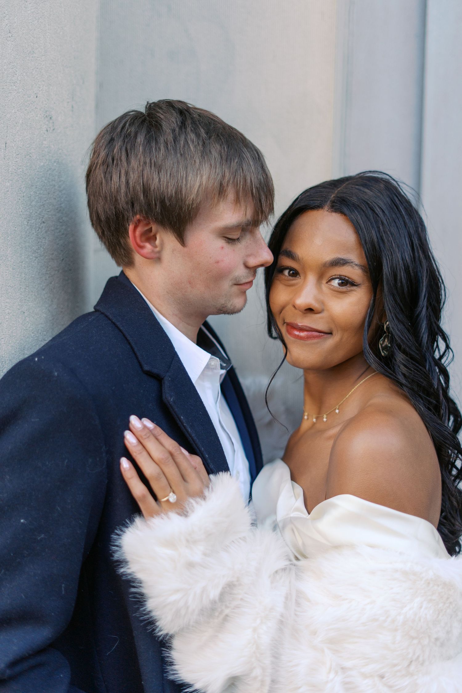 Close-up wedding portraits showing tender moments between newlyweds.